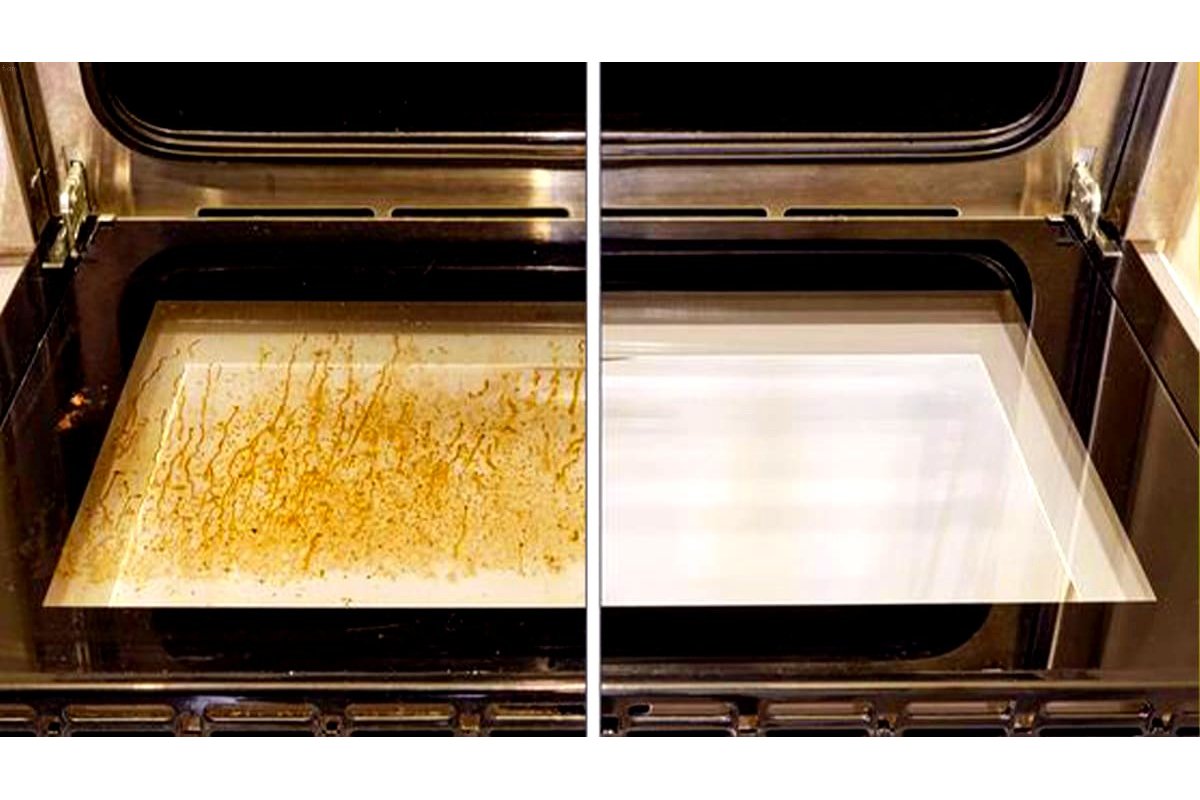 Donna pulisce il forno con un panno e detergente naturale.